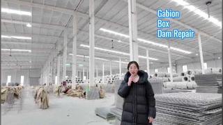 Wykorzystanie przez armię skrzynki gabionowej do produkcji barier Hesco do renowacji tamy Mocny mur oporowy
